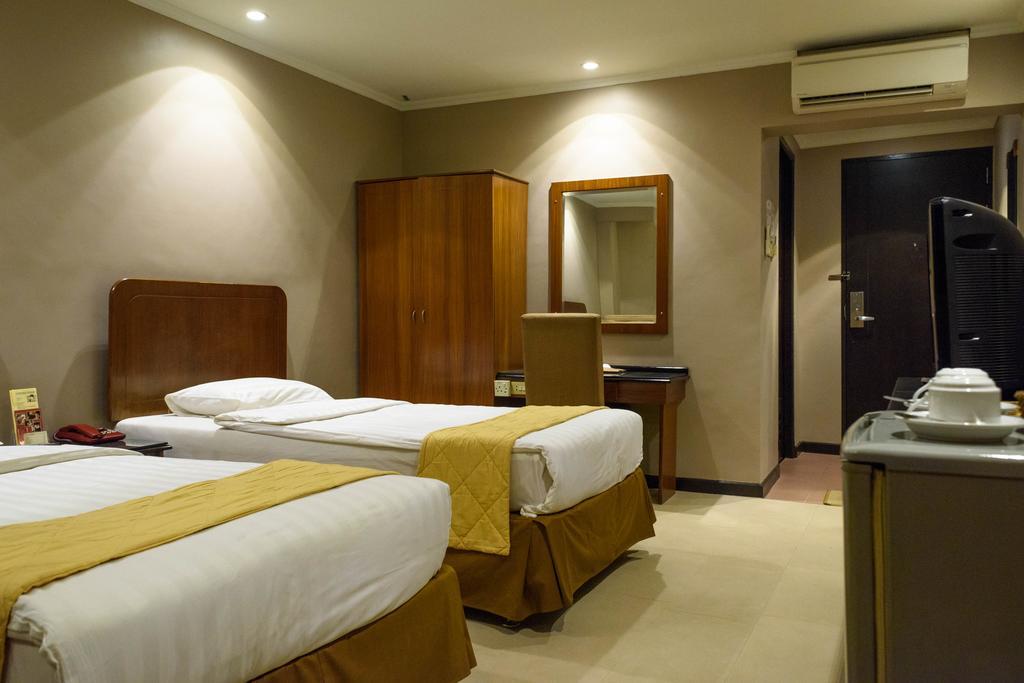 Hotel Gajahmada Понтианак Стая снимка